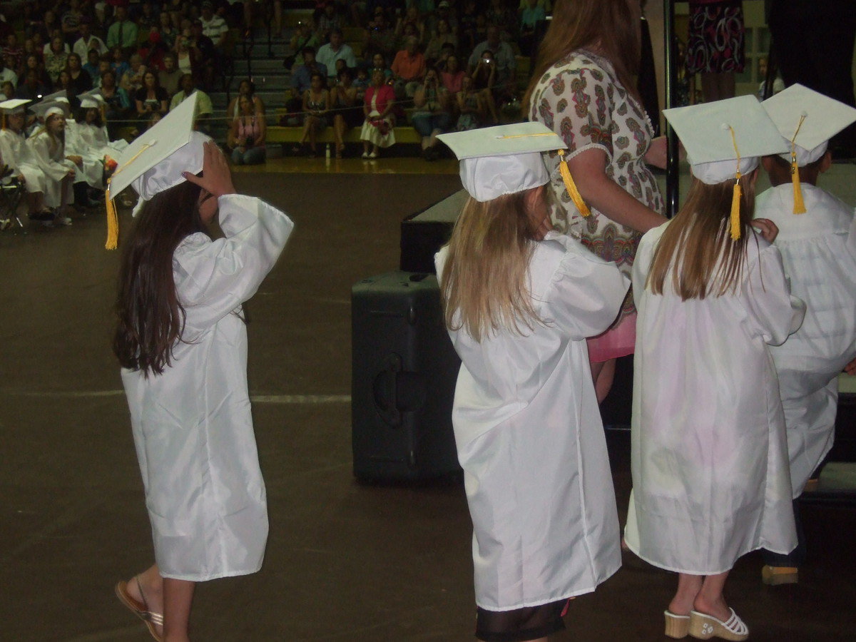 Image: Up the stairs they go to get their diplomas.