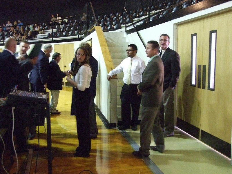 Image: The IHS School Board and musical guest, Maddie Pittmon, await their time to ascend on to the stage.