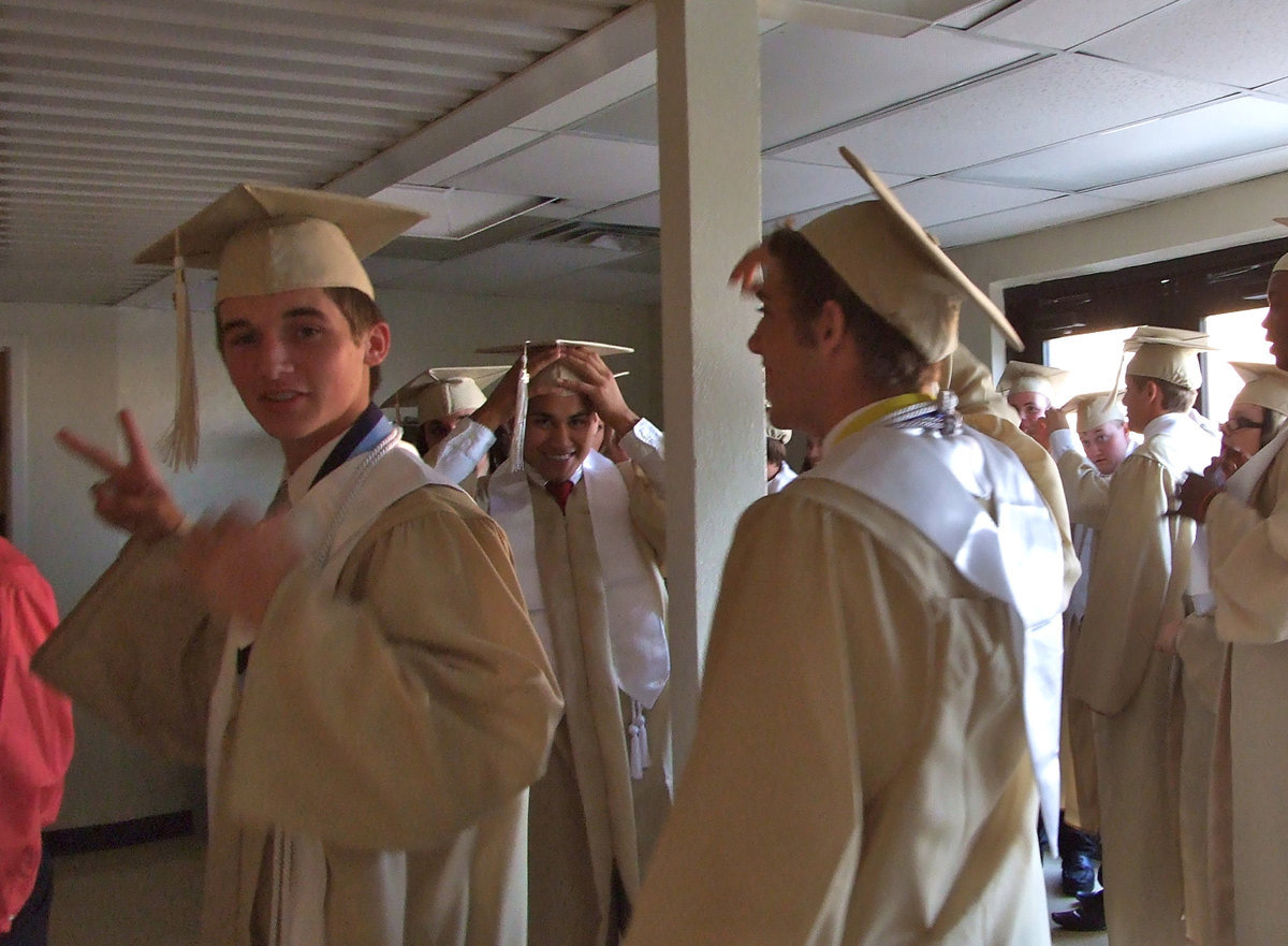 Image: Graduate Ross Stiles gets ready behind the scenes.