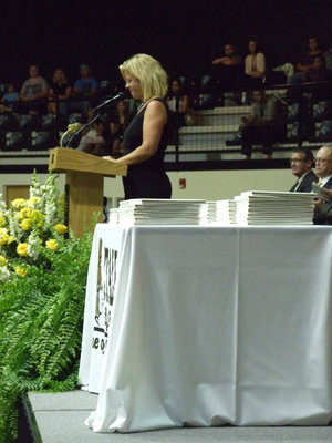 Image: IHS Counselor, Sharon Davis, talks about each graduate.