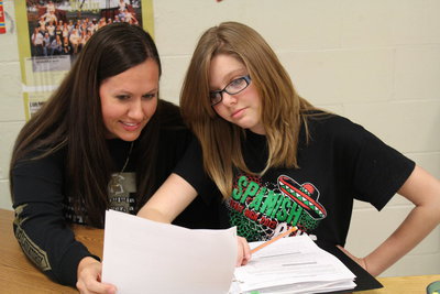 Image: Mrs. Holden working hard as she tutors Anna Riddle.