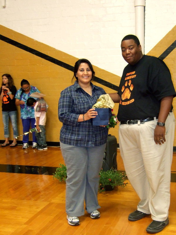 Image: Tessa South receiving the award for the Stafford PTO.