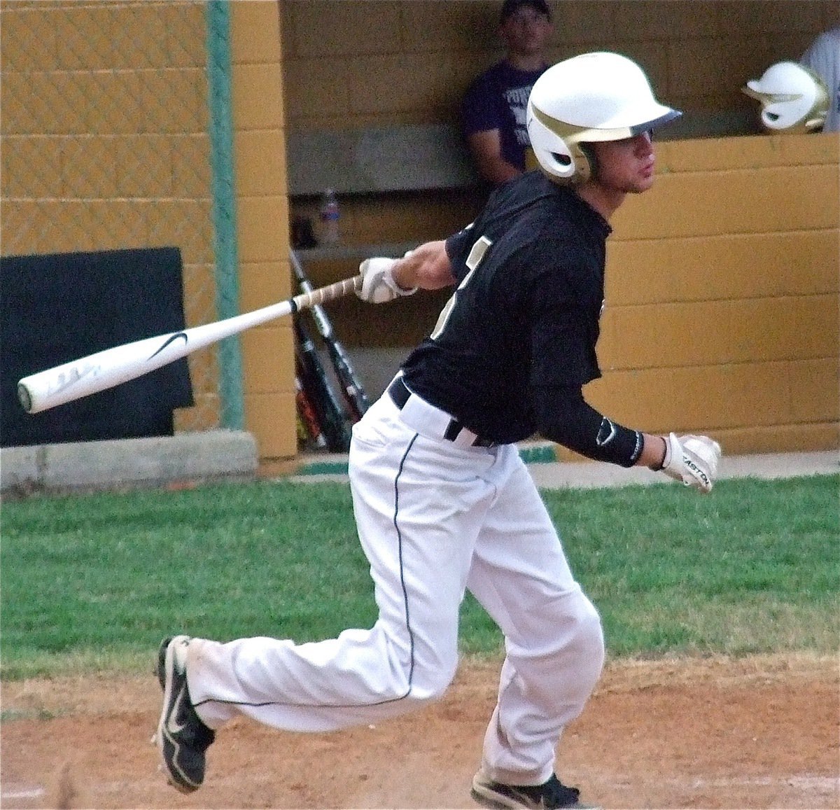 Image: Caden Jacinto(3) puts the ball in play against the Indians.