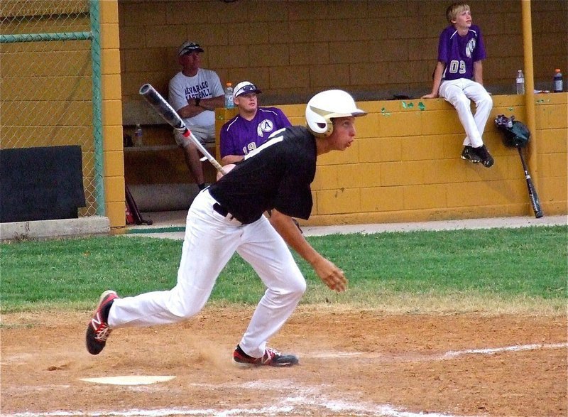 Image: Maypearl Panther Brett Pickard smacks one into play for team Italy.