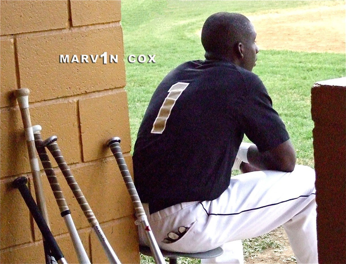 Image: Marvin Cox(1) keeps up with the action from Italy’s dugout.