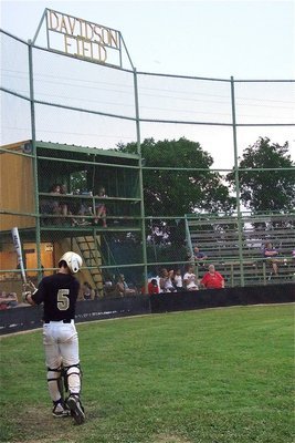 Image: Reid Jacinto(5) prepares to bat in front of the home crowd.