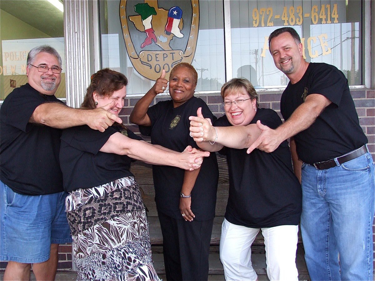 Image: Mooney’s Angels! Don’t worry folks, their fingers are not loaded. In fact, Anne Sutherland (second from the right) is only cleared to carry a pretend taser. Not pictured is Isaac Medrano.