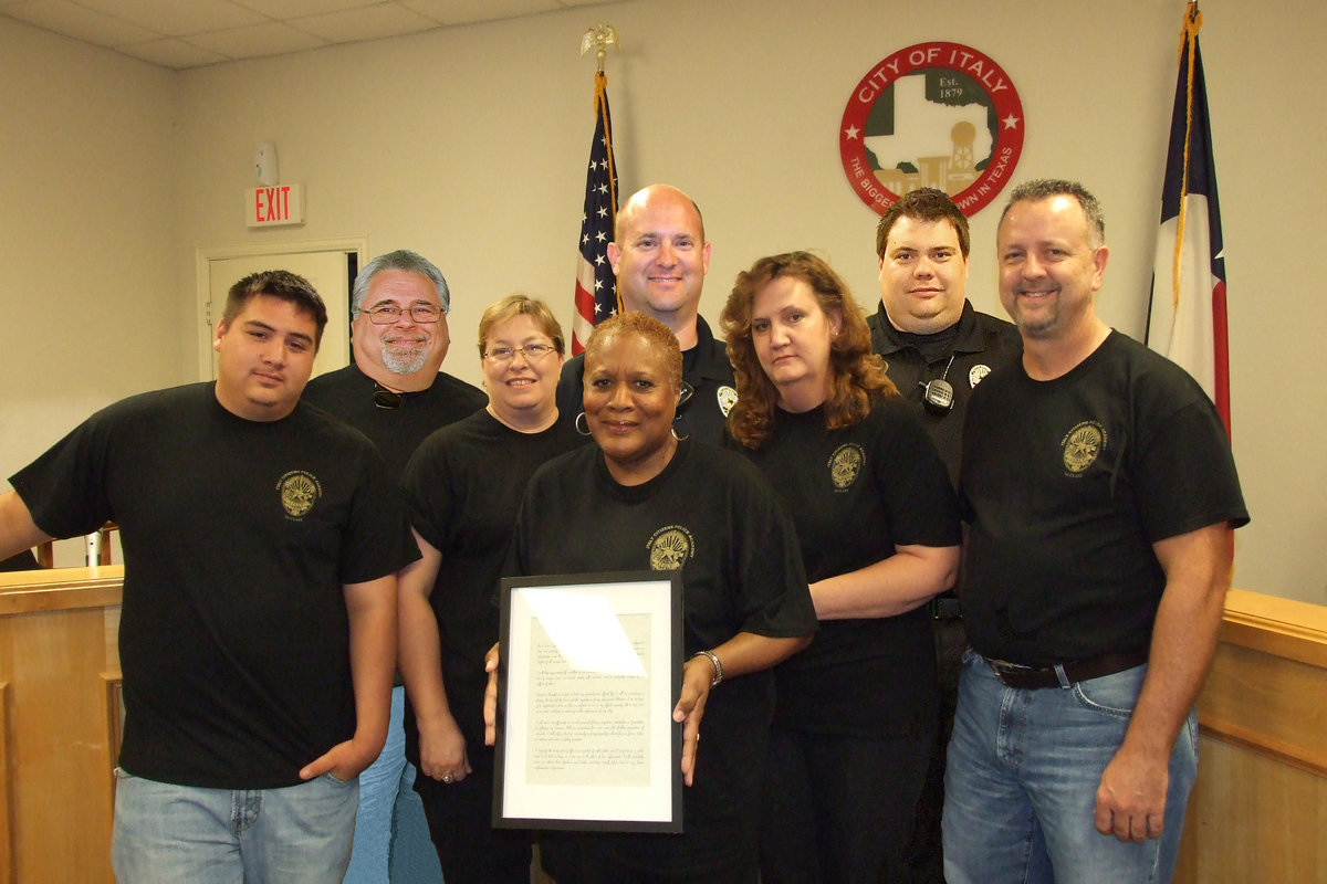 Image: Congratulations to the first class of graduates from Italy’s Citizens Police Academy! Left to right: Isaac Medrano, James Doskocil, Anne Sutherland, Elmerine Allen Bell, Officer Shawn Martin, Meg Lyons, Officer Eric Toliver and Kelly Westbrook.