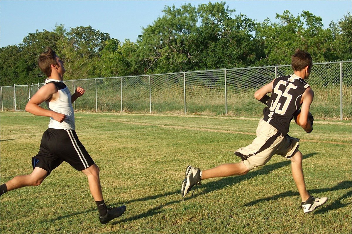 Image: …where Freshman, Ryan Connor(55), makes the running catch into the end zone for an Italy touchdown over Dawson.