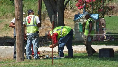 Image: The RG3 Utility crew works as a group to complete the installation of a new digital meter. Citizens will need to have manual shutoff valves installed between the meter and their home or business in order to shutoff the water in case of a leak after Italy City Hall business hours.