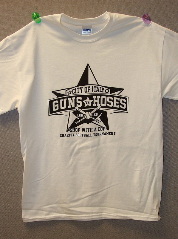 Image: Guns vs. Hoses T-shirts are available at the Italy Police Department for $15.00 with all proceeds going to the “Shop with a COP” program.