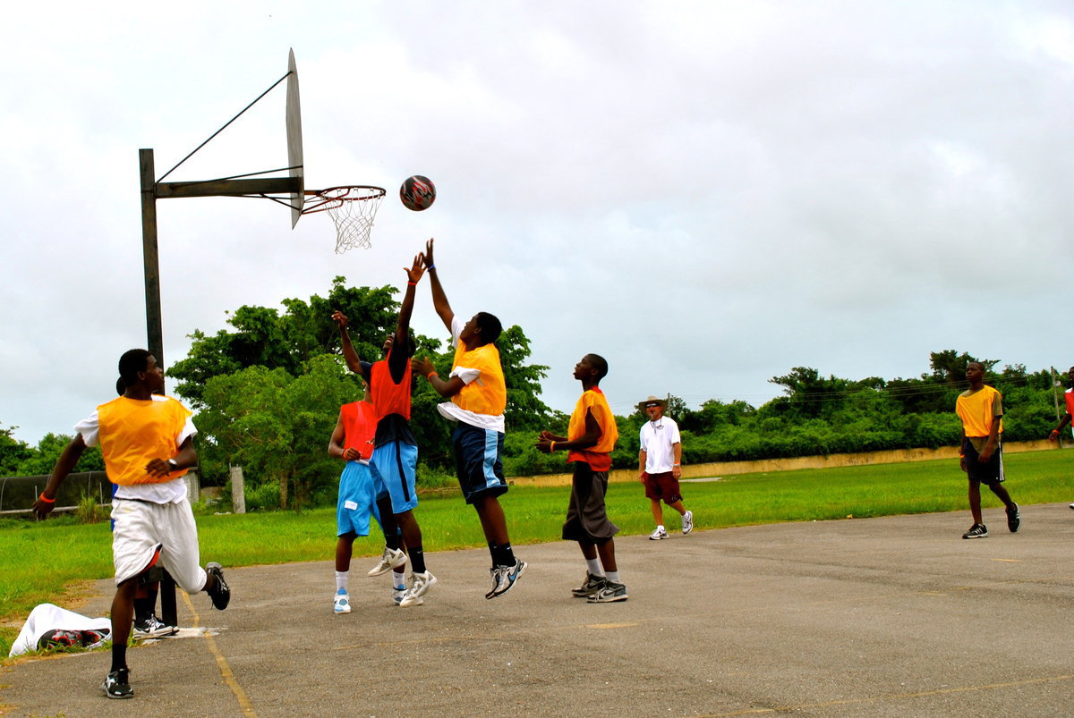 Image: Basketball Smiles camp participants take advantage of the opportunity to improve their court skills while aiming for positive futures.