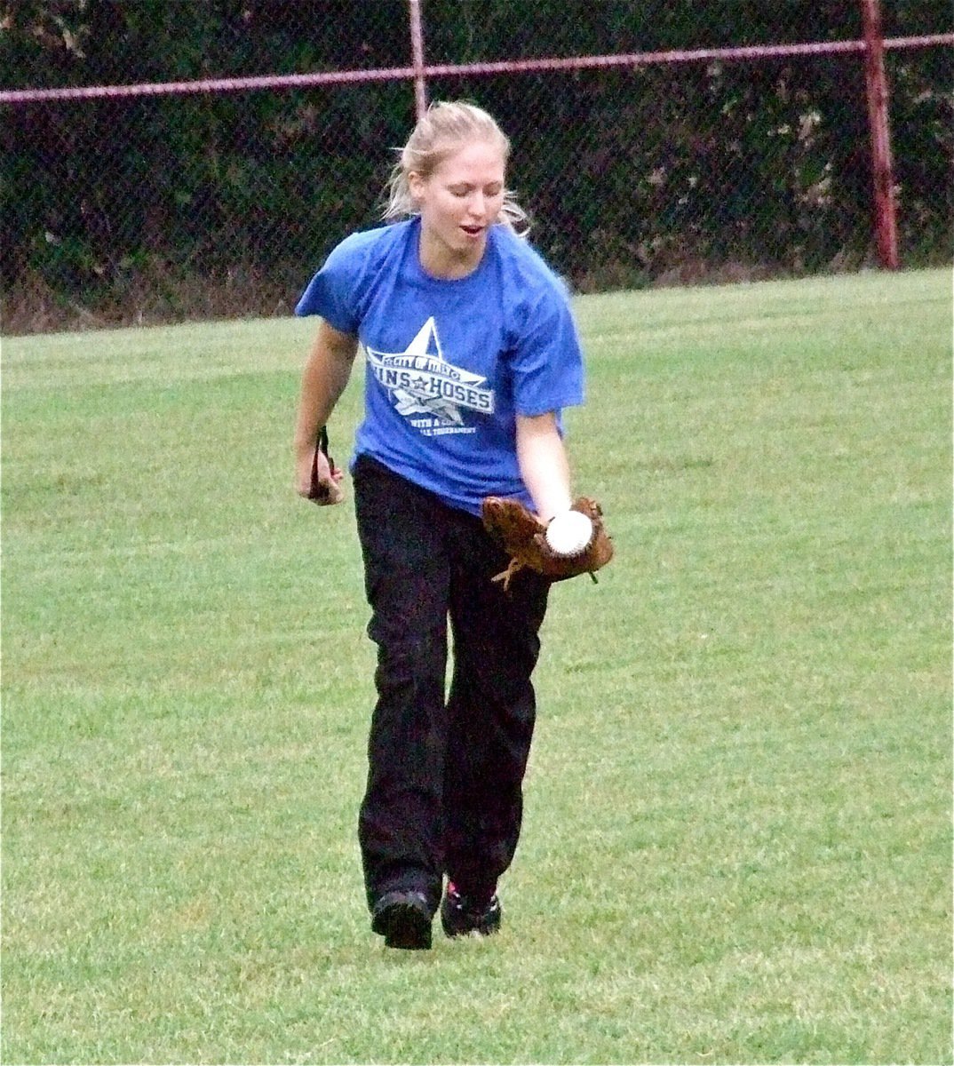 Image: I.P.D. center fielder Shelbee Landon catches a lob during warmups before making several outfield catches during the game.