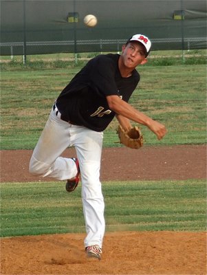 Image: Brett Pickard pitches for Italy’s select team against Grandview by way of Maypearl.