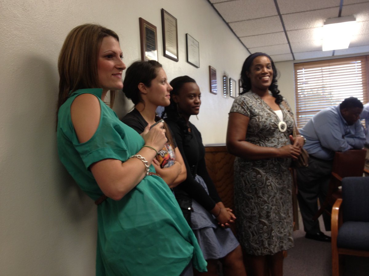 Image: Family and friends came to the board meeting to support Coach Robinson
    L-R: Cadie Pylant and Jessica Simon Ward (both 2006 IHS graduates and classmates of Coach Robinson’s) Brianna (sister) and Felicia Burkhalter (proud mom)