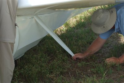 Image: Mike removes the seem tape before detaching one of the glider’s wings.