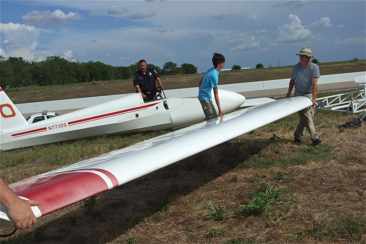 Image: The second wing is disconnected and laid on the ground, as well.