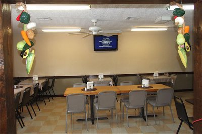Image: A freshly painted dining area features a flat screen television.