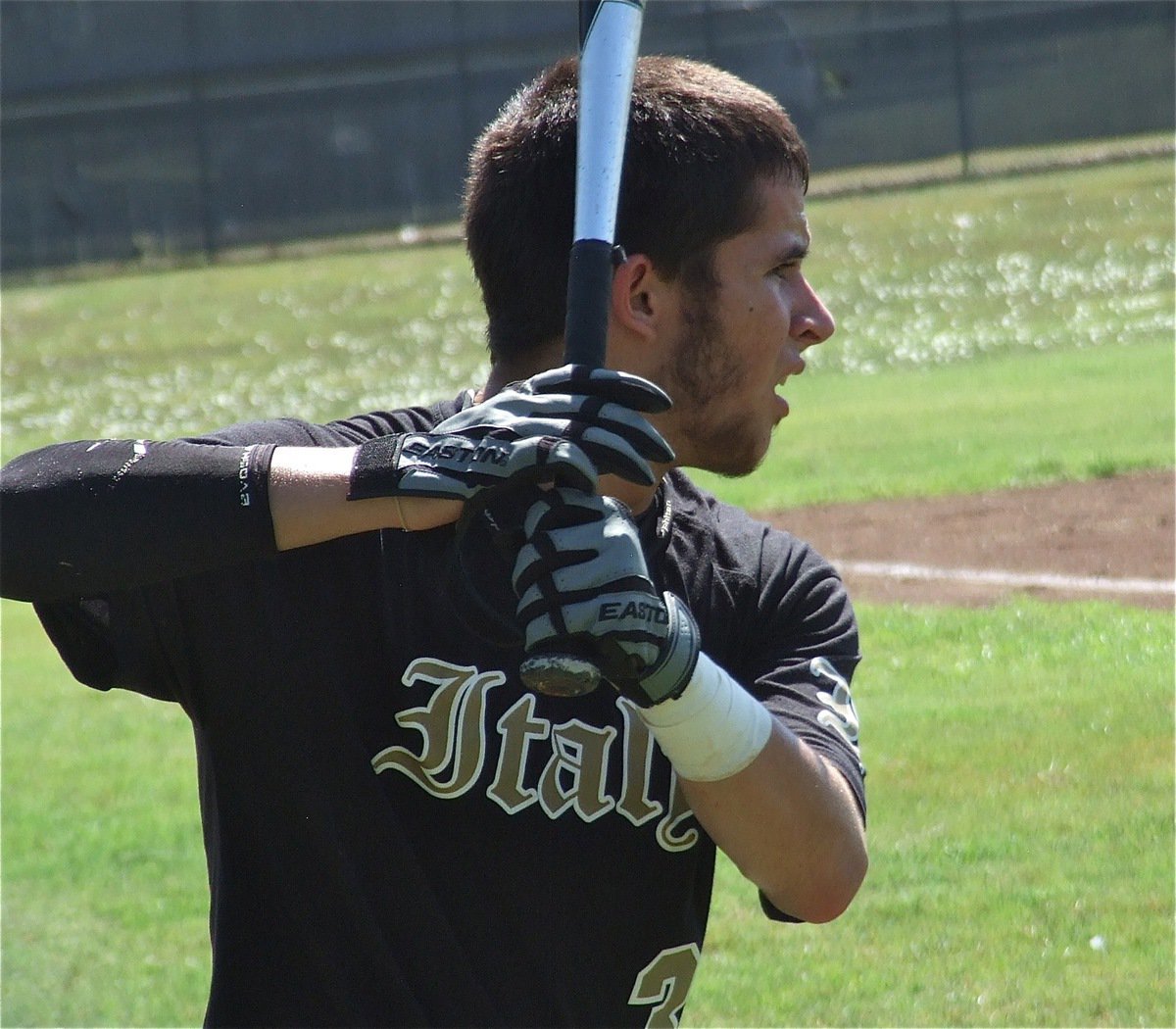 Image: Caden Jacinto gets in a few practice swings before his at bat.