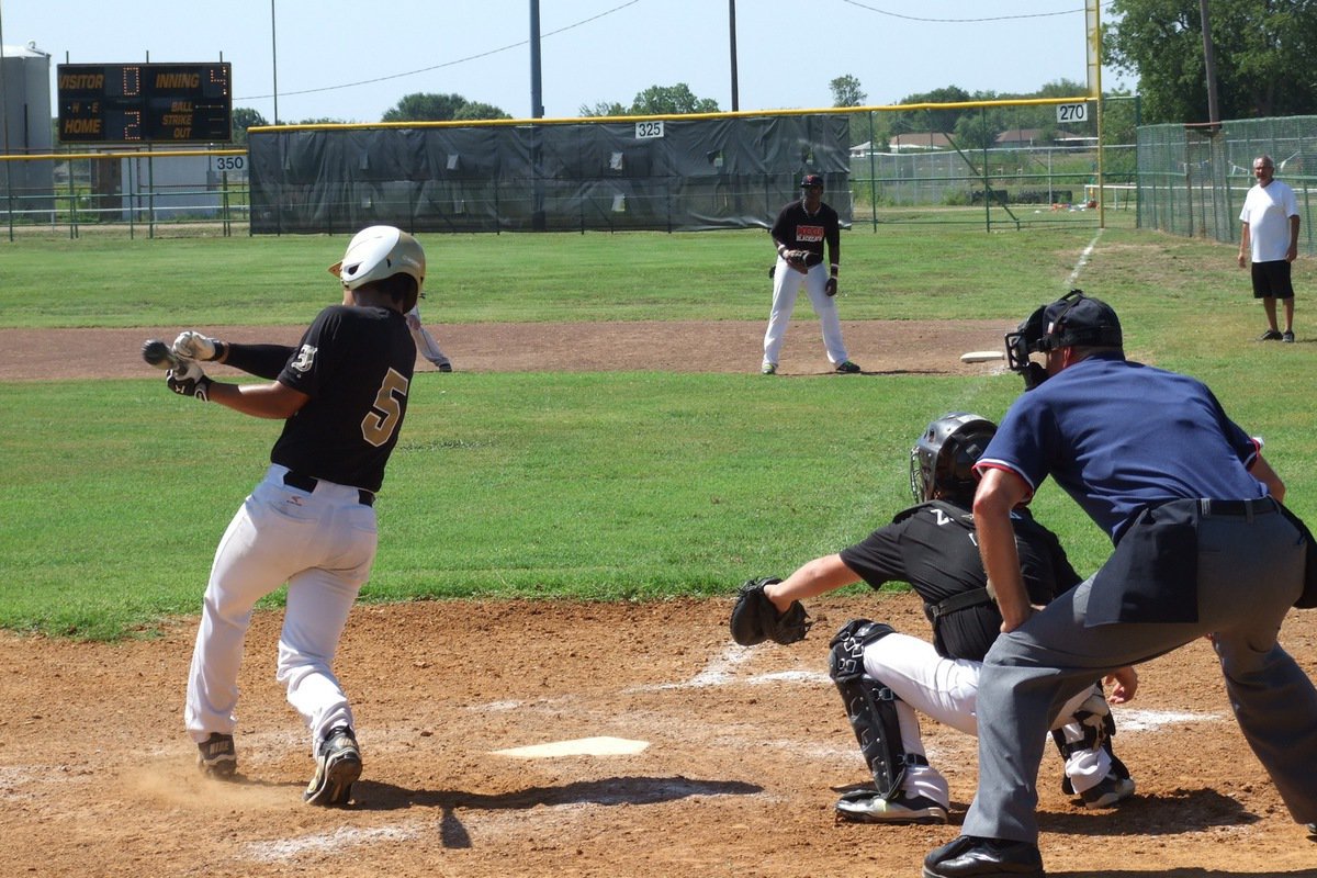 Image: Reid Jacinto(5) advances the runner on first for Italy.