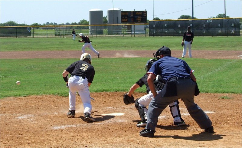 Image: Trailing 4-0, Reece Marshall(3), of Avalon, attempts a bunt to advance Italy’s base runner.