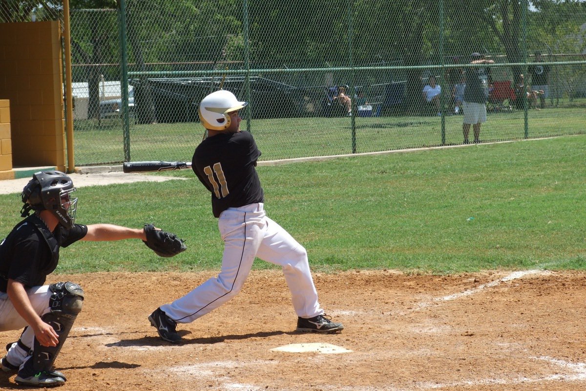 Image: Tyler Anderson(11) rips a single.