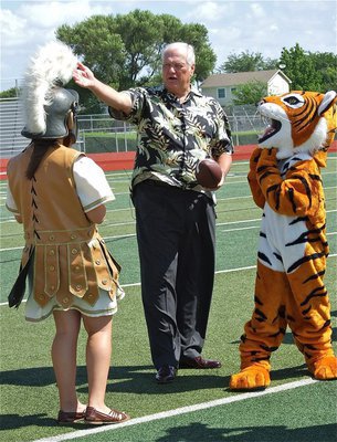 Image: “Coach” Dale Hansen schools the event mascots on what offensive football play to run for the commercial shoot.