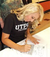 Image: You can never have enough pictures of your child signing her Letter of Intent to play college softball. Megan Richards will by flying with the Falcons at UTPB.