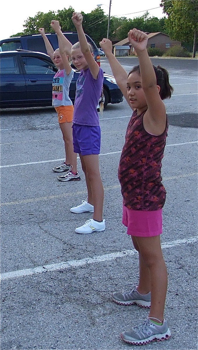 Image: A-Team cheerleaders practicing at Stafford Elementary in Italy on Monday.