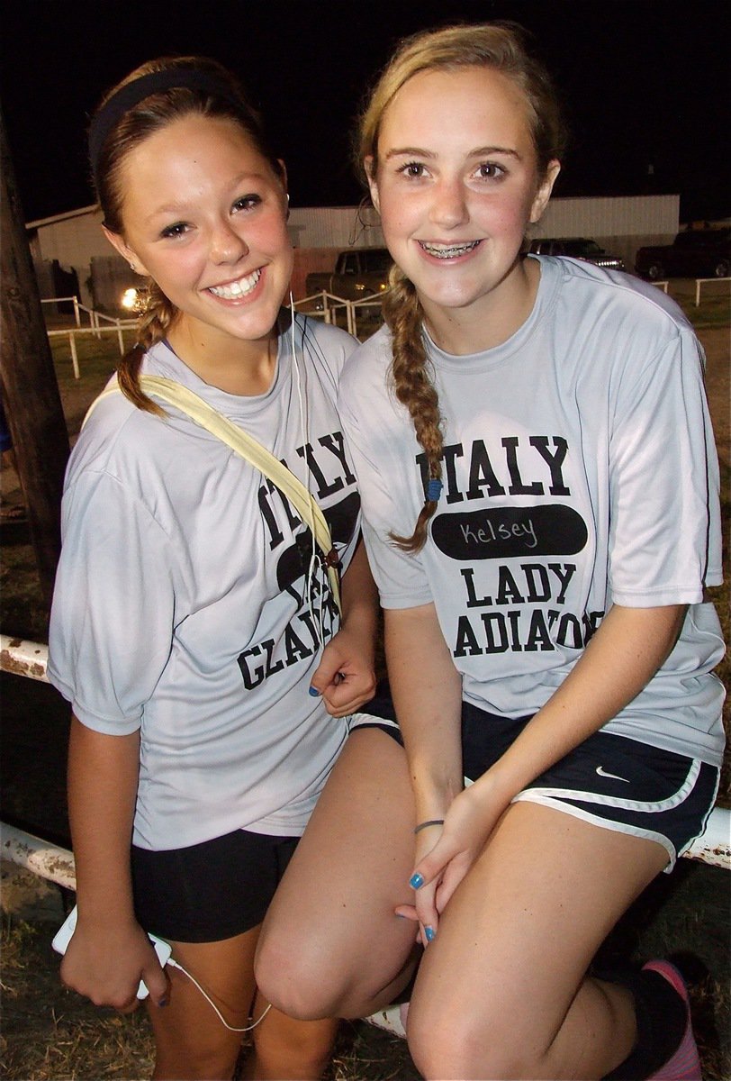 Image: Lady Gladiator Volleyball players Bailey Eubank and Kelsey Nelson are still smiling despite a brutal Midnight Madness workout inside the domed Coliseum.