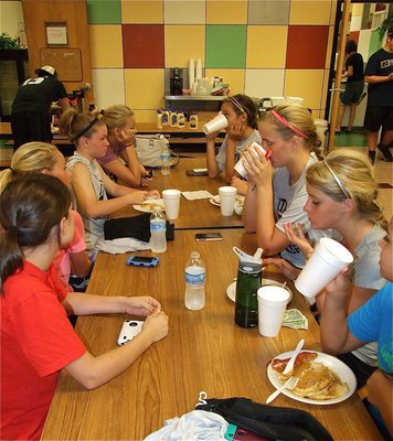 Image: Team Unity: Lady Gladiator Volleyball players practiced together and then ate together during the pancake breakfast.