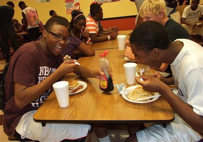 Image: Midnight Madness will hopefully prove to be the “Breakfast of Champions” as Gladiators John Hughes, Cody Boyd and Jaray Anderson have a few pancakes for luck.