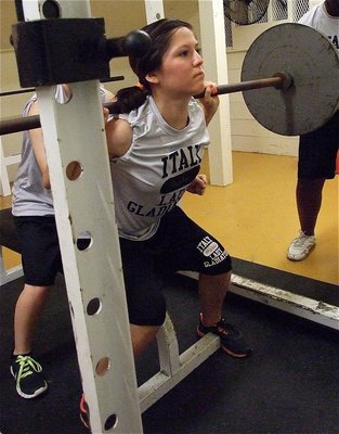 Image: Paola Mata, a senior, has a determined look during maxes.