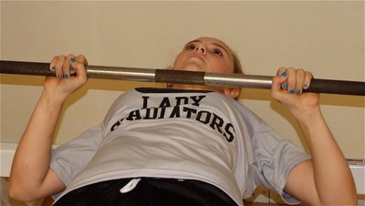 Image: Kelsey Nelson maxes out on the bench press.
