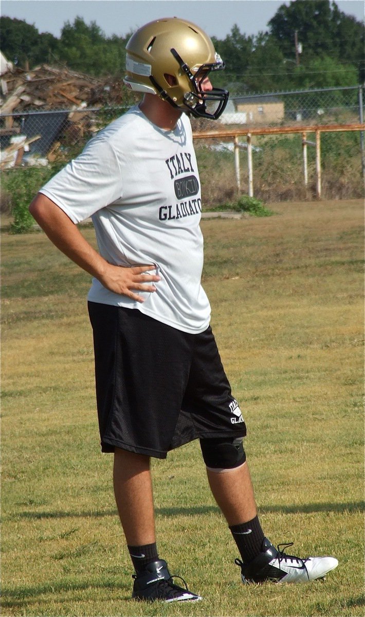 Image: Senior left tackle Zackery Boykin listens and learns during practice.