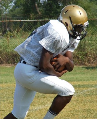 Image: Senior tailback Ryheem Walker is ready to pound and gain ground against the competition.