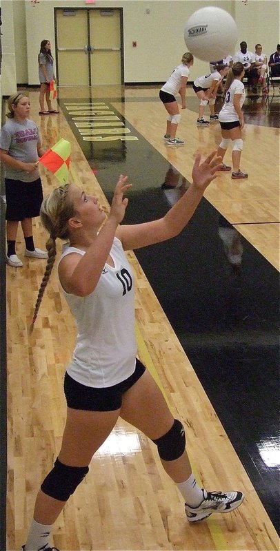 Image: Lady Gladiator Madison Washington(10) serves to Hubbard.