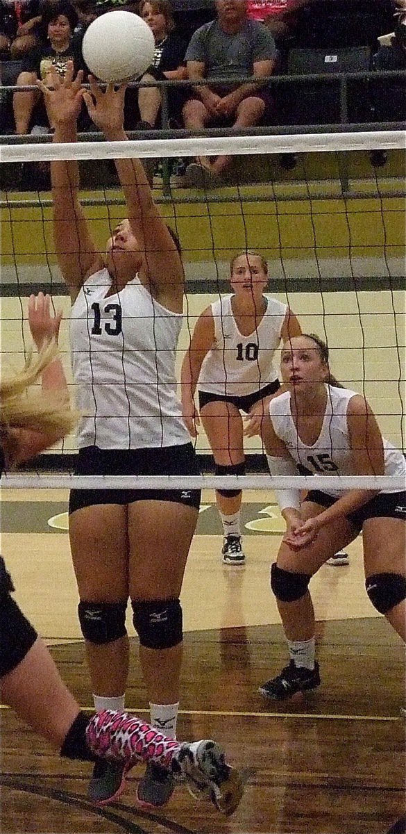 Image: Lady Gladiator Alyssa Richards(13) blocks the ball against Hubbard.