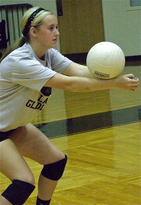 Image: Kelsey Nelson bumps the ball during the JV practice.