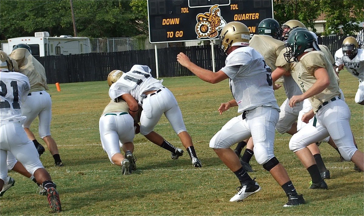 Image: Senior inside linebacker Reid Jacinto(11) brings down an Eagle back.