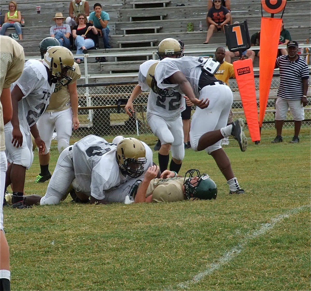 Image: Senior middle linebacker Ryheem Walker(10) puts the pop on the Valley Mills quarterback.