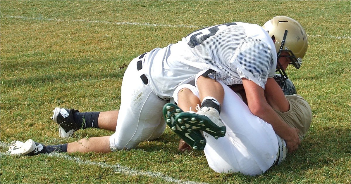 Image: Zackery Boykin(55) brings down an Eagle running back.