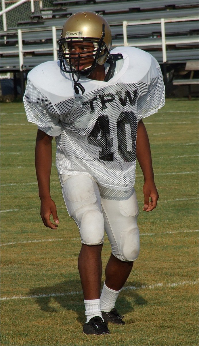 Image: JV Gladiator Jaray Anderson(40) is ready attack on defense.