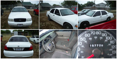 Image: 2003 Ford Crown Victoria / 157,728 Miles showing.