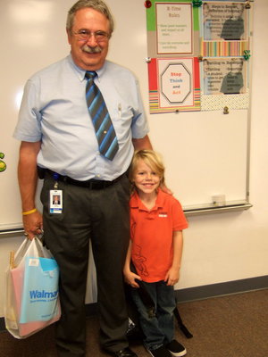 Image: John Allen (grandfather) and Jon Hernandez. Jon is going into the first grade.