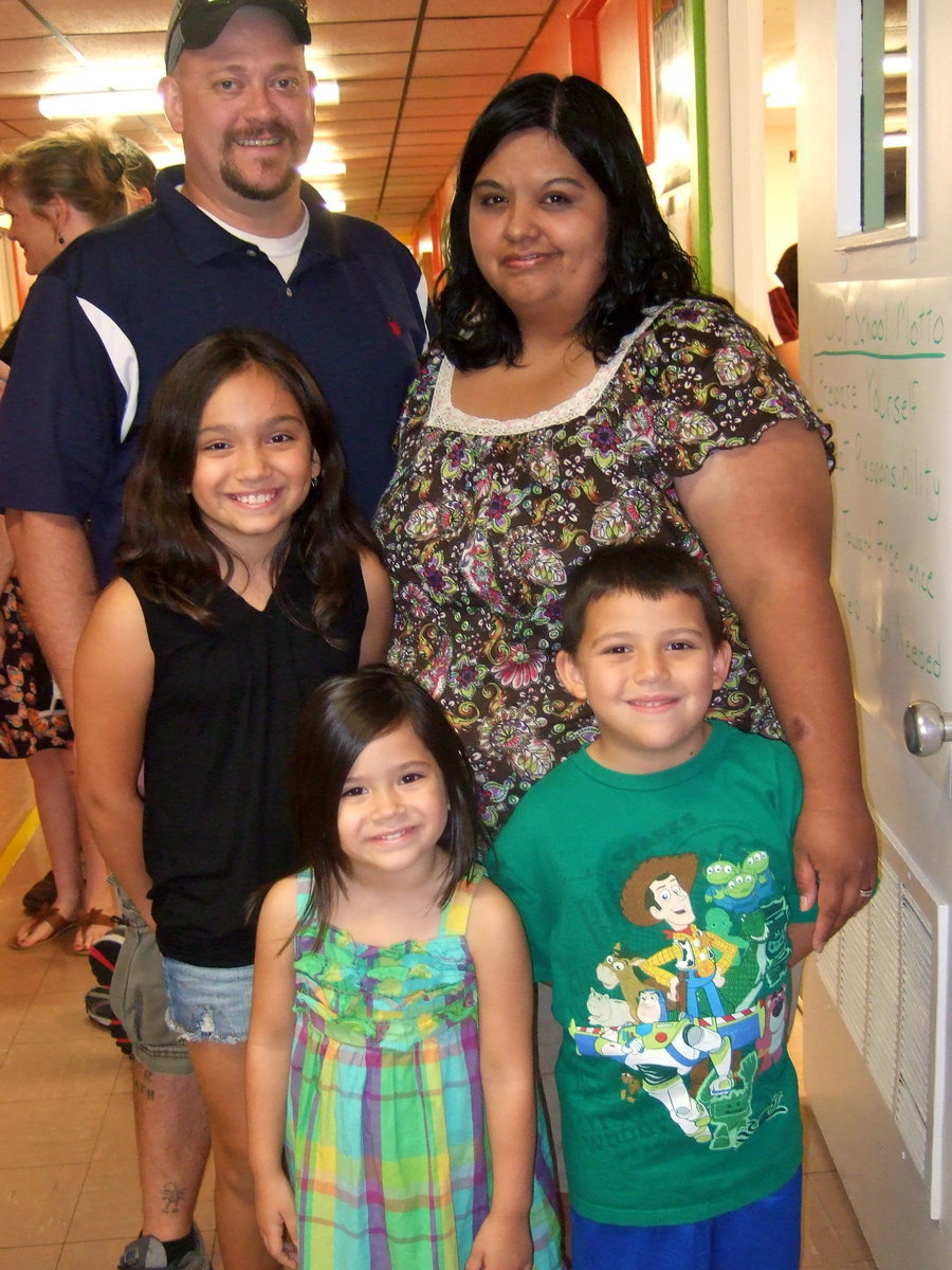 Image: Nathan Carr, Nelda Carr, Hannah Carr (5th grade), Halee Carr (Pre-K) and Hagan Carr (1st grade) were ready to meet their new teachers.