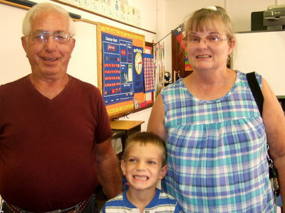 Image: Clemente Meccariello, his son C. J. and his wife Etta were happy to be at school meeting the teachers.