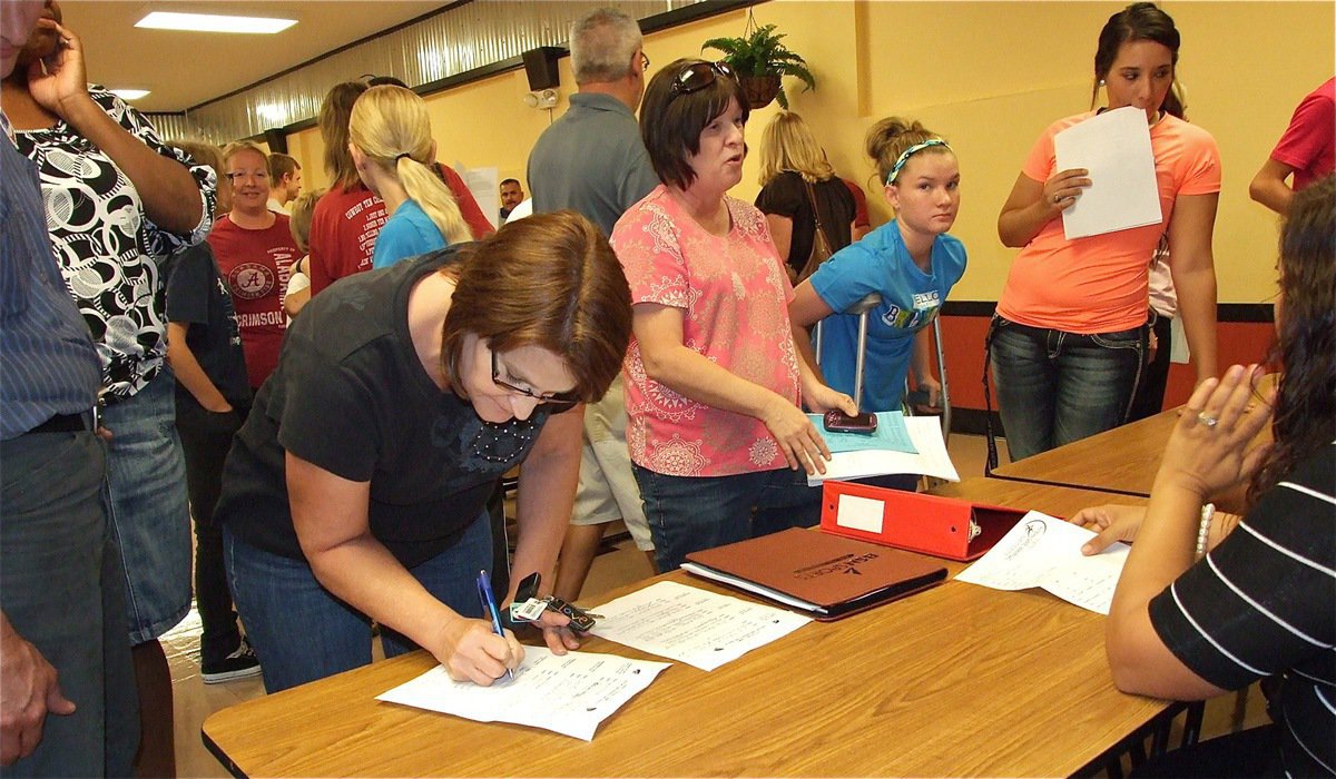 Image: Parents signup to work the concession stand on game nights. Thanks for volunteering!