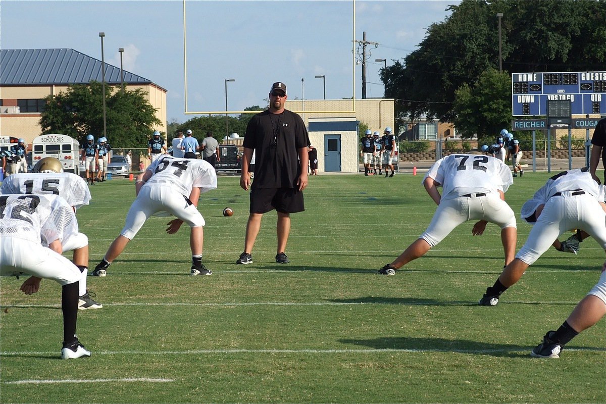 Image: “Are you looking at us?” Coach Hollywood takes his JV Gladiators thru their pre-game routine.