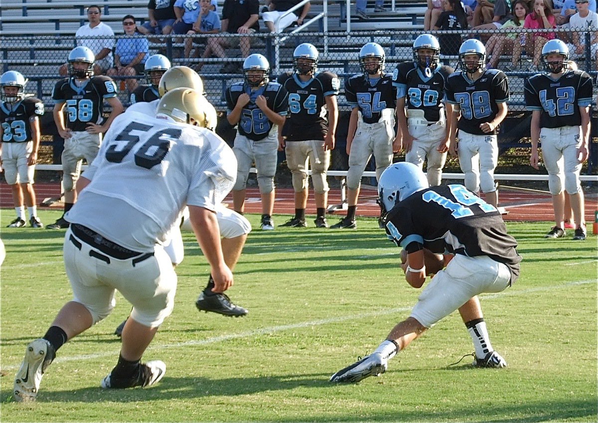 Image: John Byers(56) closing in on a Cougar back that seems to be screaming, "Blow the whistle! Blow the Whistle!